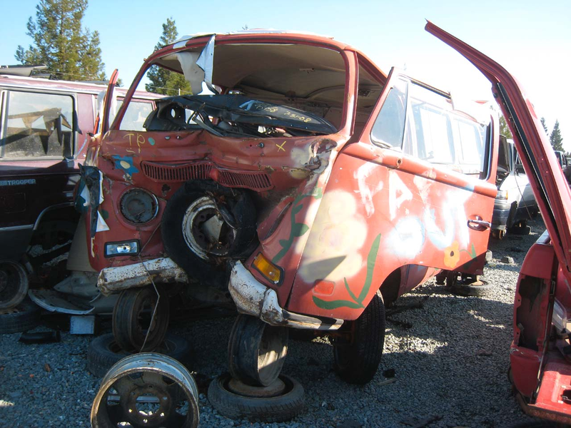 Illustration for article titled Who's Writing This Script? Stoned VW Bus Hugs Tree, Now Awaits Crusher
